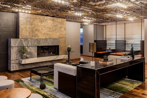 Clubhouse with stylish furnishings and open seating area at The Metlo Apartments, a Greystar luxury community in vibrant city setting