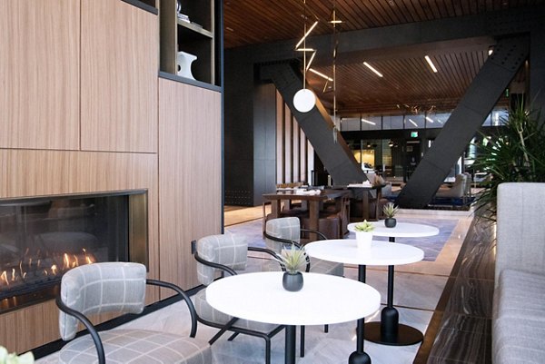 Modern clubhouse with spacious seating areas at The Metlo Apartments, perfect for luxury living in an amenity-rich environment