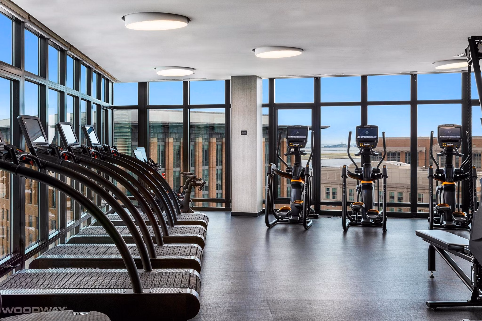 State-of-the-art fitness center with modern equipment at The Metlo Apartments