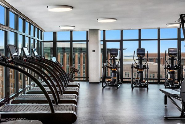 State-of-the-art fitness center with modern equipment at The Metlo Apartments