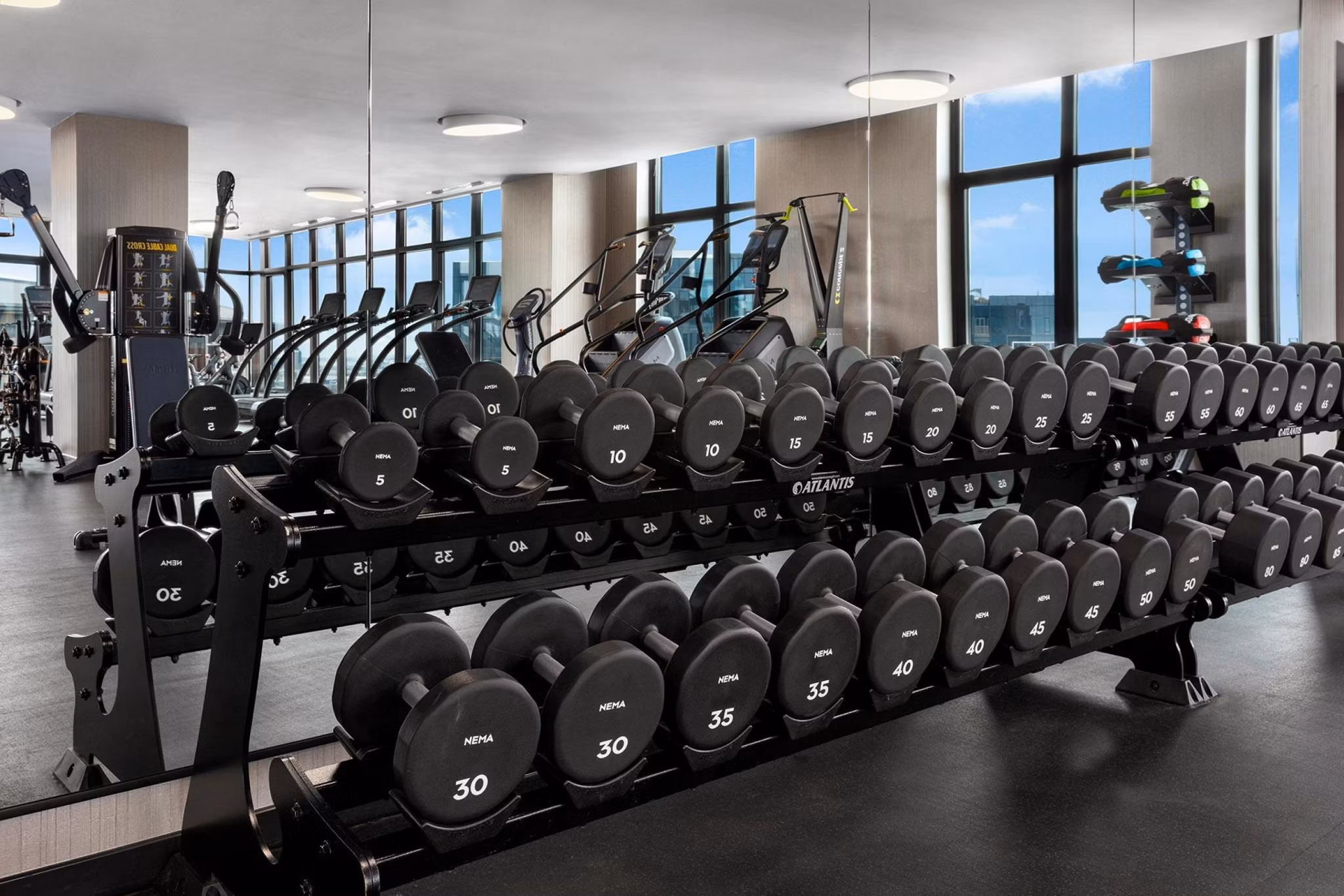Modern fitness center with state-of-the-art equipment at The Metlo Apartments, perfect for luxury living and active lifestyles
