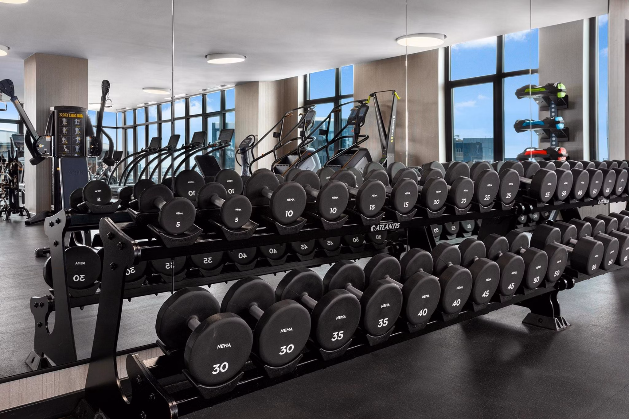 Modern fitness center with state-of-the-art equipment at The Metlo Apartments, perfect for luxury living and active lifestyles