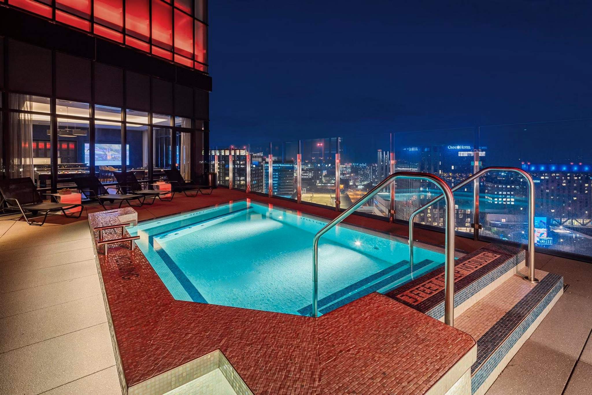 Rooftop pool with skyline views at The Metlo Apartments, a luxury residence by Greystar