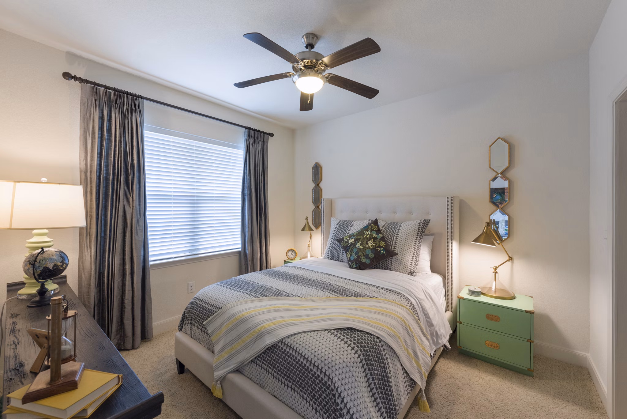 Cozy bedroom with modern decor at Urban Crest Apartments