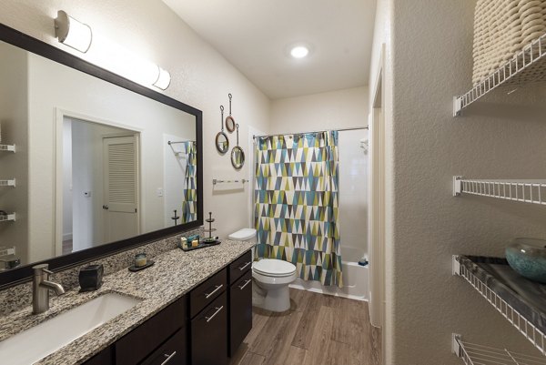 Bathroom featuring modern fixtures and sleek design at Urban Crest Apartments