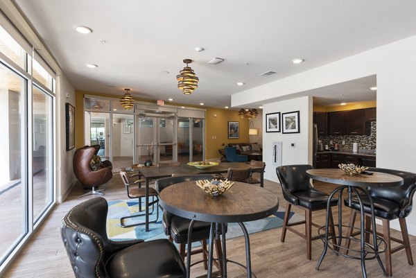 Contemporary clubhouse featuring stylish seating and modern decor at Urban Crest Apartments