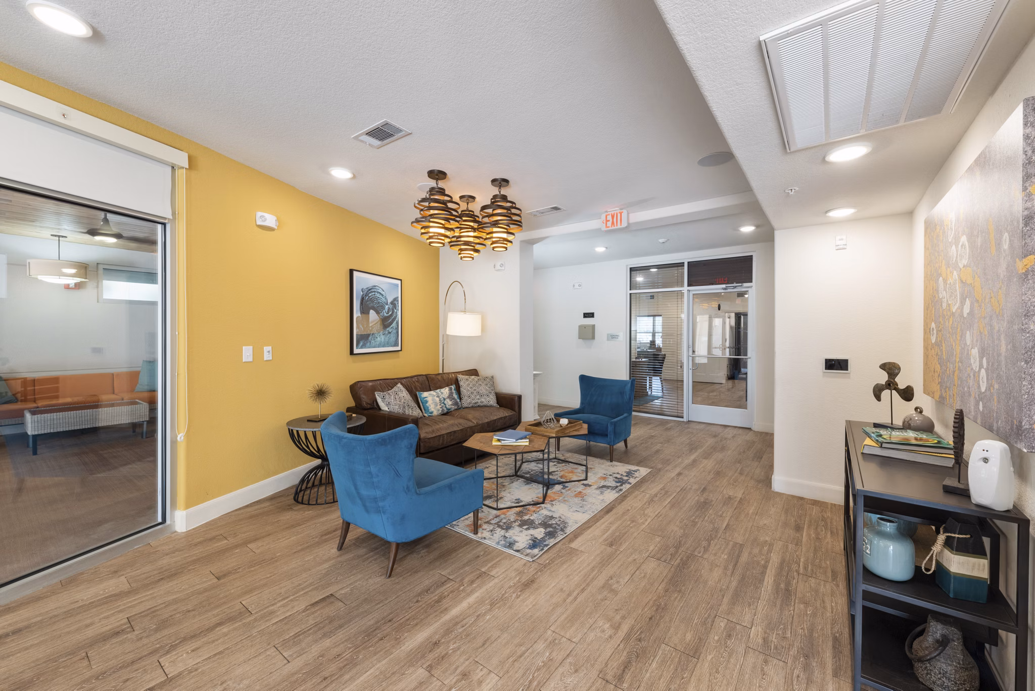 Clubhouse featuring modern design and comfortable seating at Urban Crest Apartments