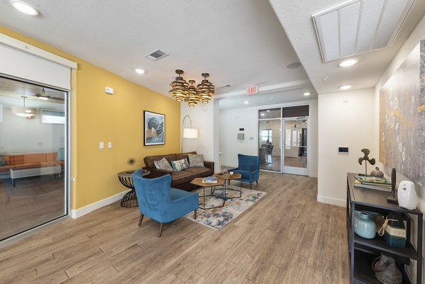 Clubhouse featuring modern design and comfortable seating at Urban Crest Apartments