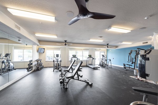State-of-the-art fitness center with modern equipment at Urban Crest Apartments