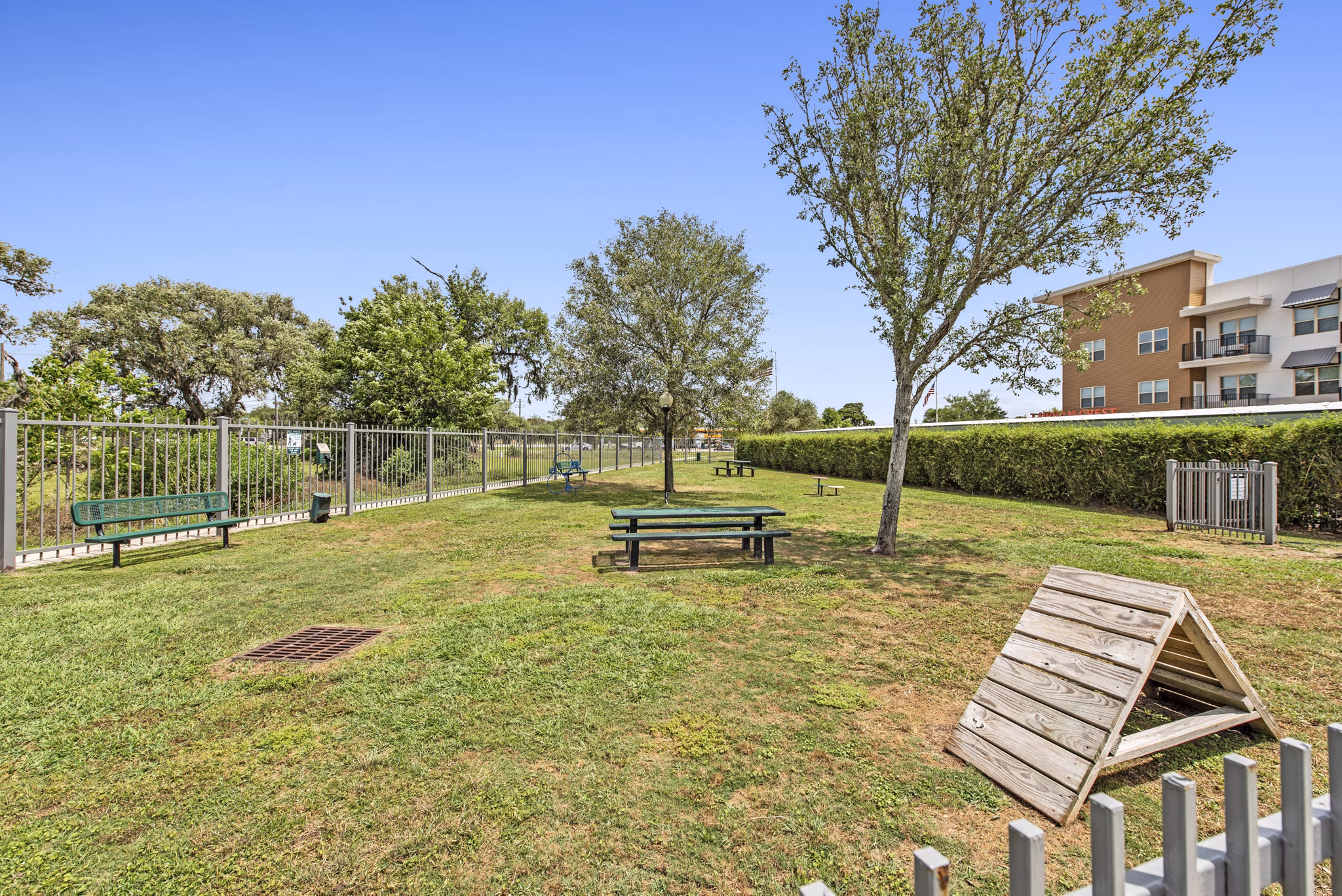 Dog park featuring agility equipment at Urban Crest Apartments
