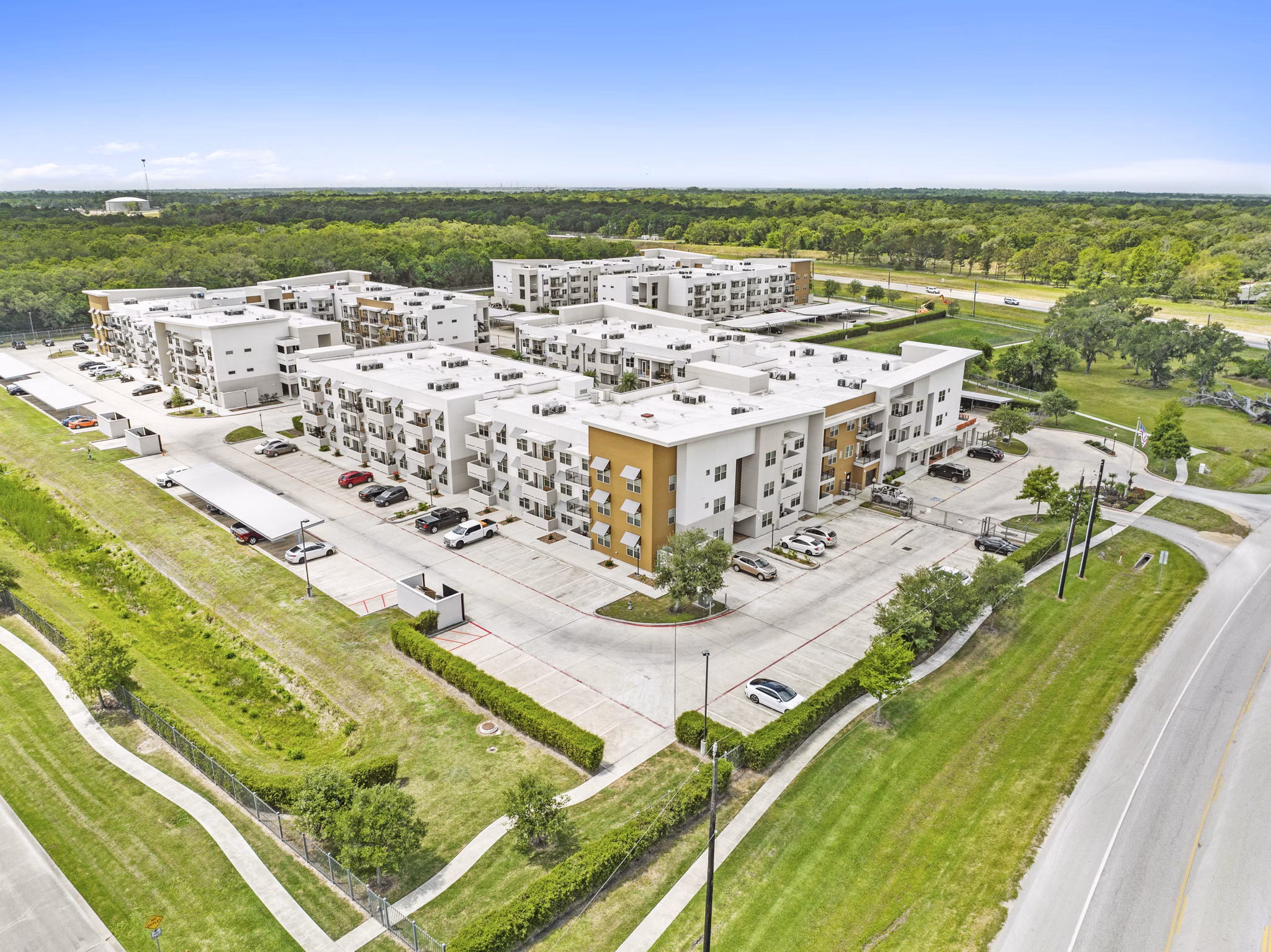 Scenic view from Urban Crest Apartments showcasing luxury living near greenery