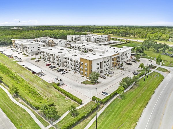 Scenic view from Urban Crest Apartments showcasing luxury living near greenery