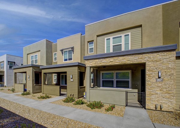 Town Germann Apartments: Elegant view of luxury apartments in Chandler, featuring modern design and lush landscaping