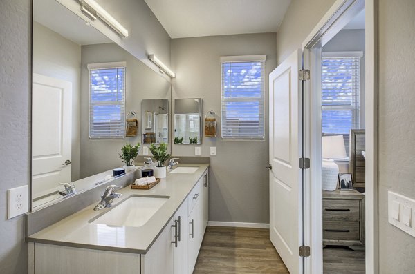 Luxurious bathroom featuring modern fixtures at Town Germann Apartments, a Greystar property