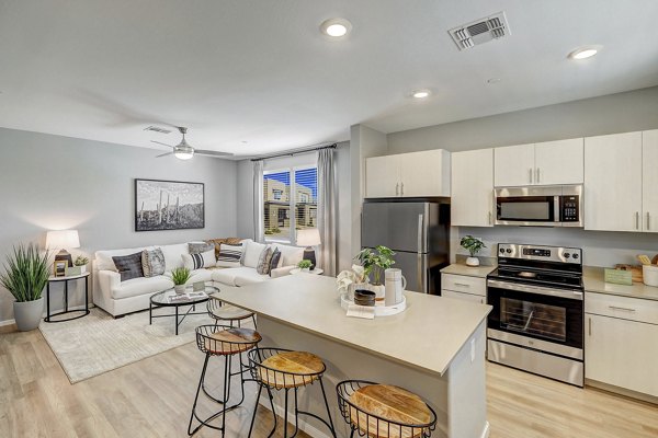 Elegant kitchen with stainless steel appliances in Town Germann Apartments