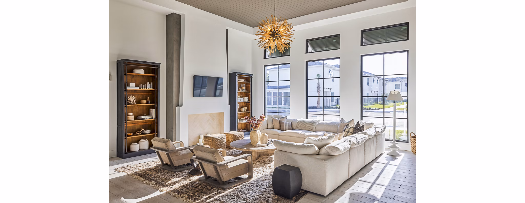 Clubhouse featuring modern amenities and stylish seating at Asbury Apartments