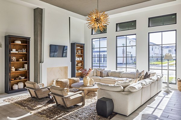 Clubhouse featuring modern amenities and stylish seating at Asbury Apartments