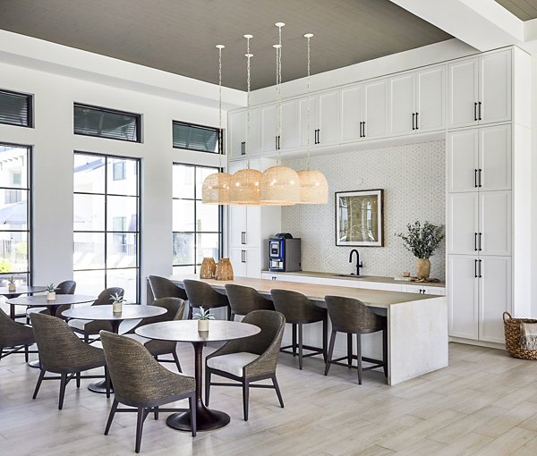 Clubhouse featuring modern design and spacious seating at Asbury Apartments, a luxury community by Greystar
