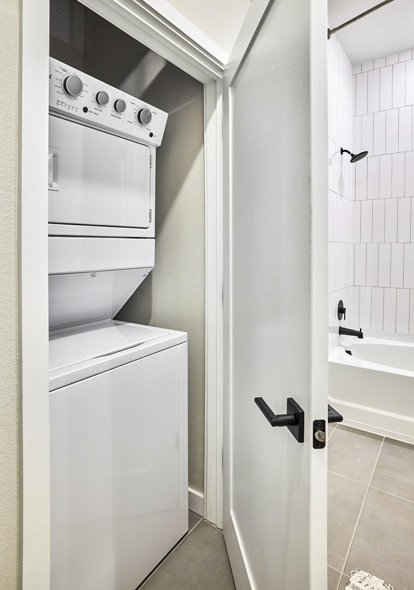 Laundry room at Asbury Apartments