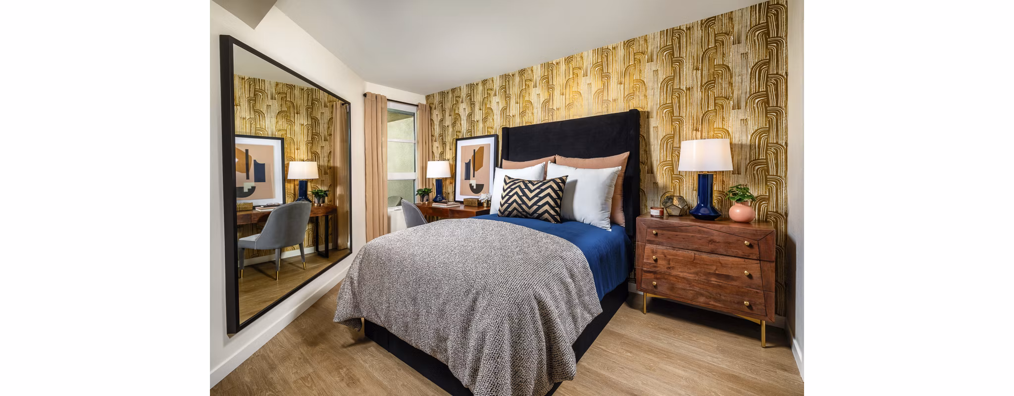 Spacious bedroom with modern dÃ©cor at Rae on Sunset Apartments in a luxurious setting