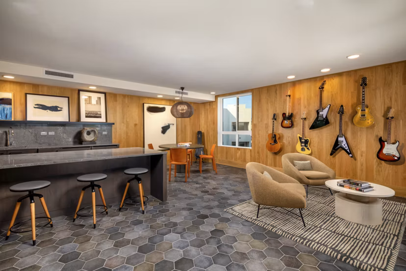 Clubhouse featuring modern design and comfortable seating at Rae on Sunset Apartments in West Hollywood
