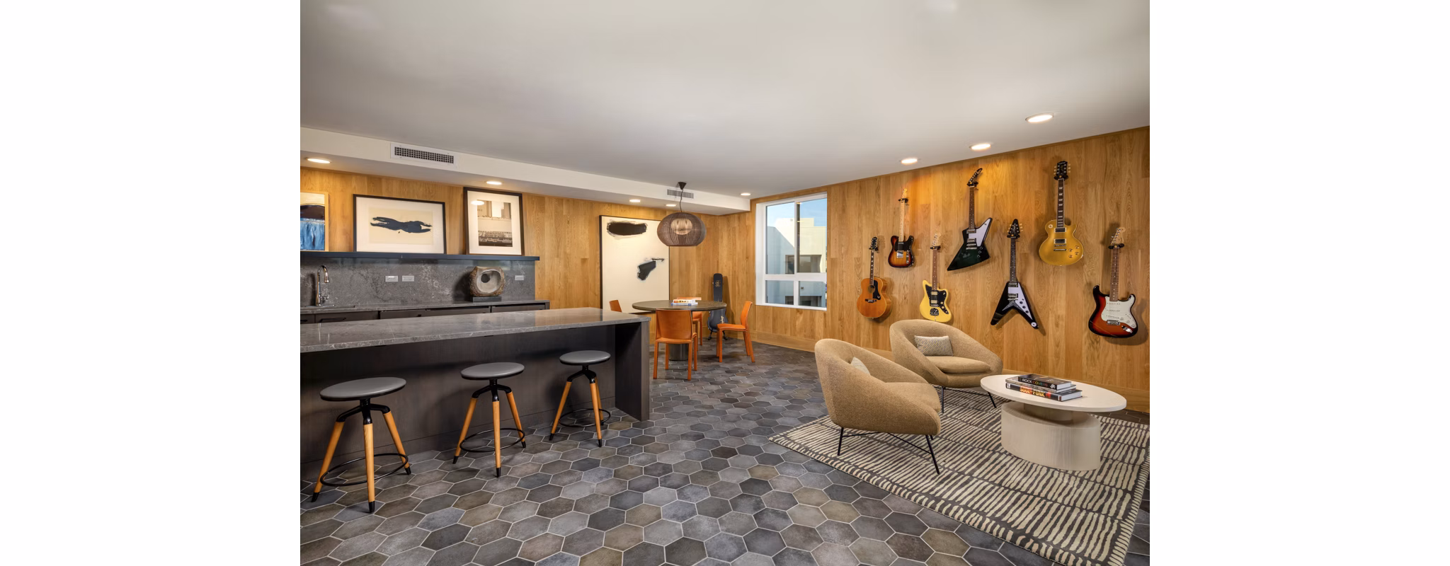 Clubhouse featuring modern design and comfortable seating at Rae on Sunset Apartments in West Hollywood