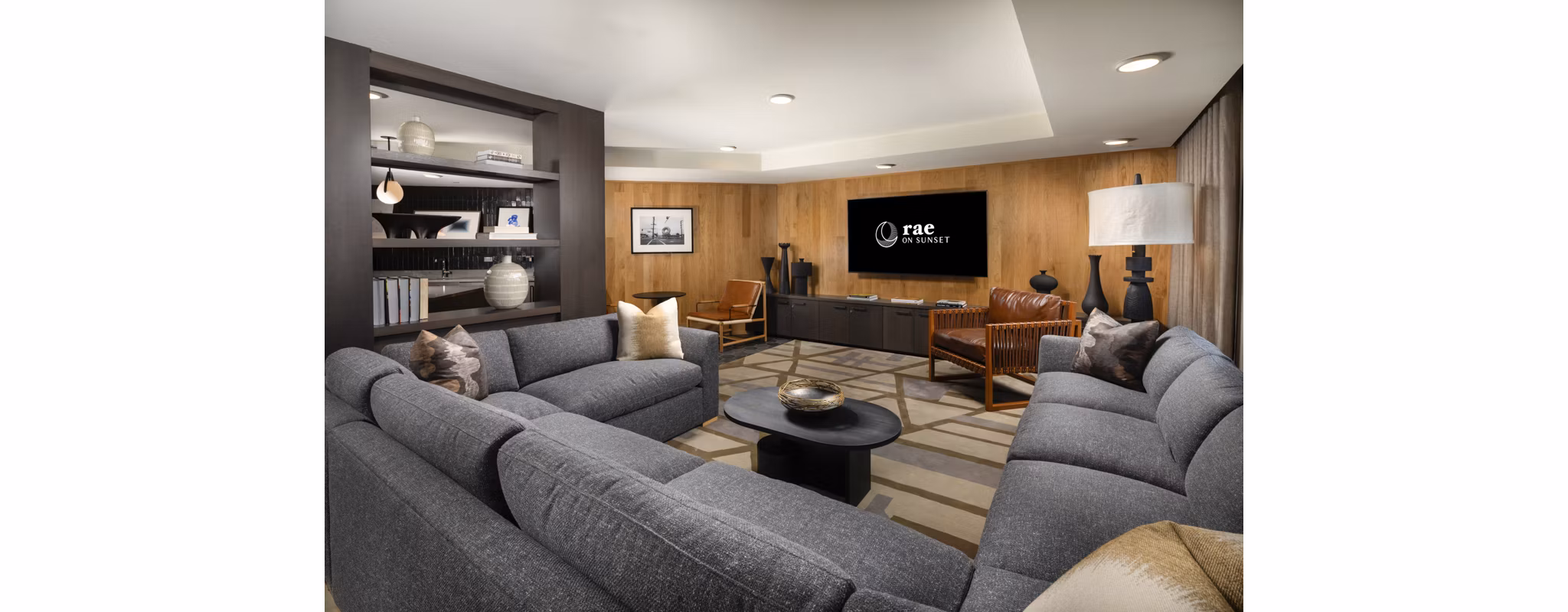 Clubhouse with modern design and seating at Rae on Sunset Apartments, luxury living in a prime location