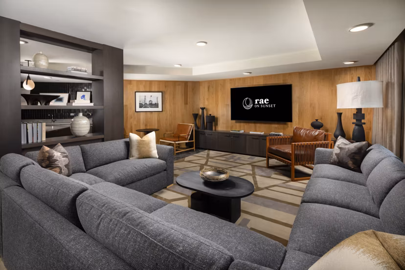 Clubhouse with modern design and seating at Rae on Sunset Apartments, luxury living in a prime location