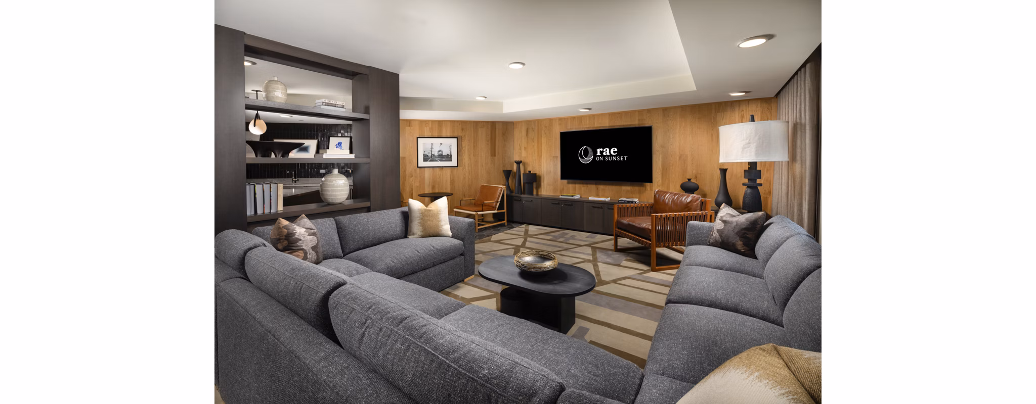 Clubhouse with modern design and seating at Rae on Sunset Apartments, luxury living in a prime location