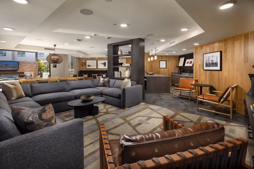 Spacious clubhouse with modern amenities at Rae on Sunset Apartments, ideal for luxury living and social gatherings