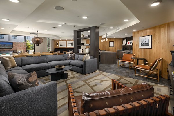 Spacious clubhouse with modern amenities at Rae on Sunset Apartments, ideal for luxury living and social gatherings