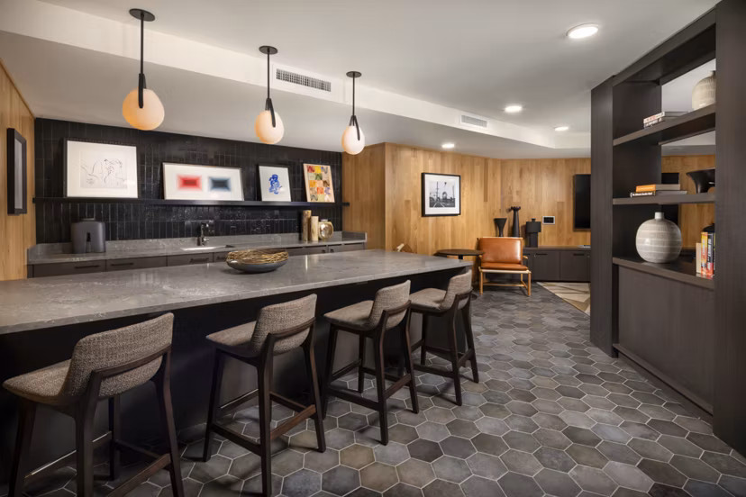 Clubhouse featuring modern design and comfortable seating at Rae on Sunset Apartments