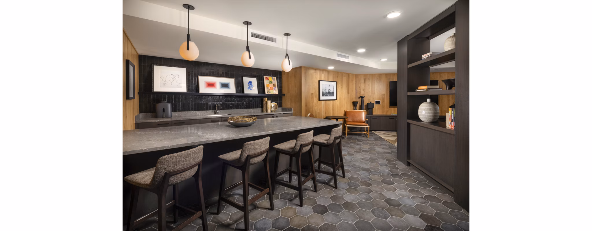 Clubhouse featuring modern design and comfortable seating at Rae on Sunset Apartments