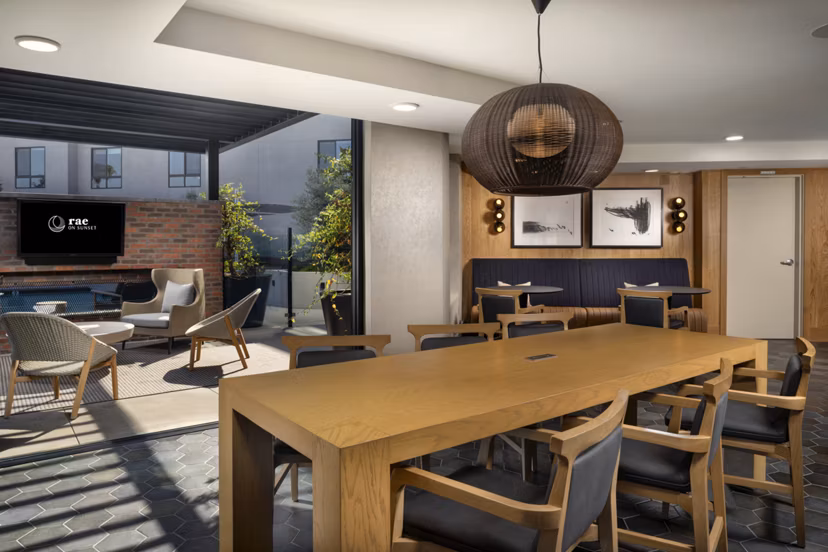 Modern clubhouse with luxury seating at Rae on Sunset Apartments; ideal for socializing and relaxation
