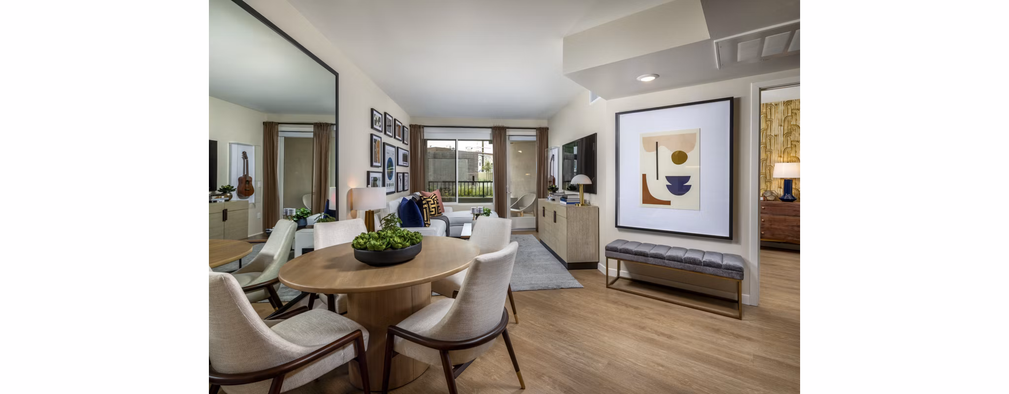 Dining area with modern furnishings at Rae on Sunset Apartments in luxury Greystar collection
