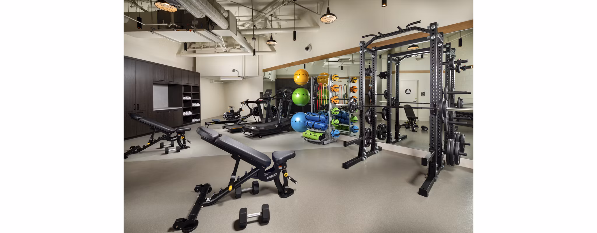Modern fitness center with advanced equipment at Rae on Sunset Apartments in Los Angeles