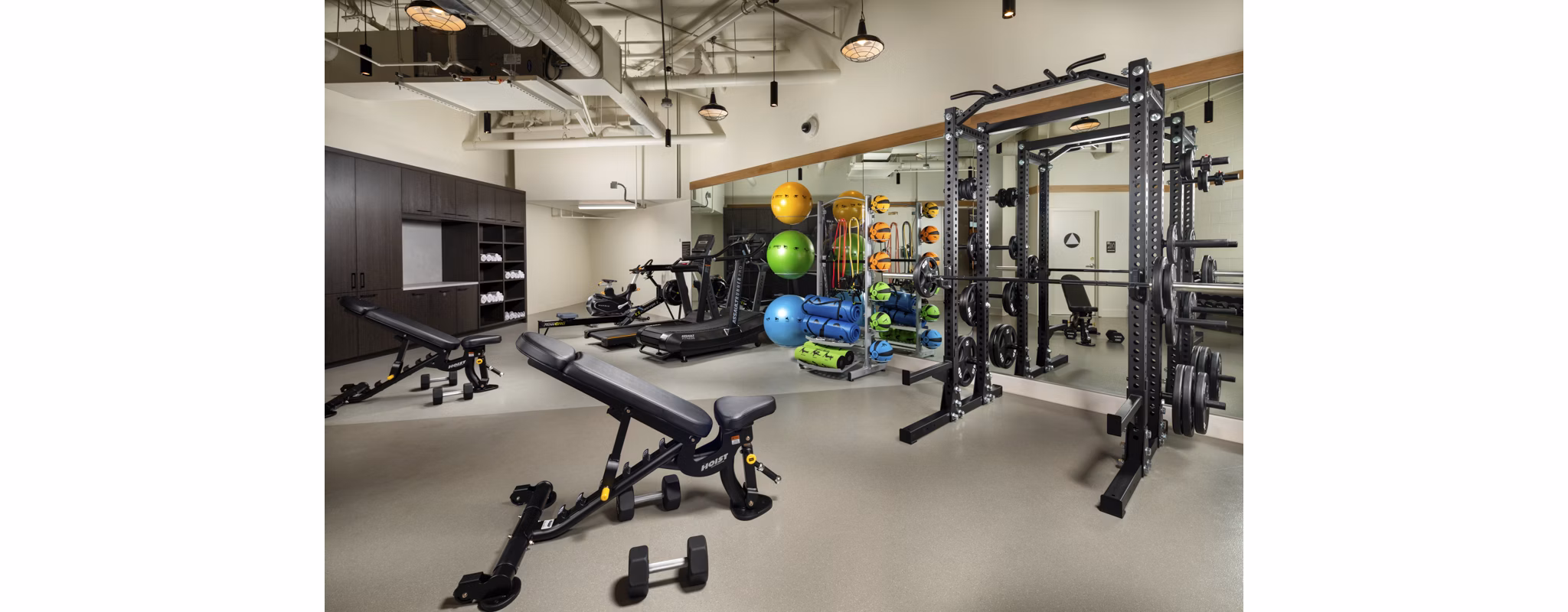 Modern fitness center with advanced equipment at Rae on Sunset Apartments in Los Angeles