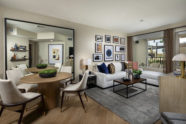 Modern kitchen with stainless steel appliances at Rae on Sunset Apartments