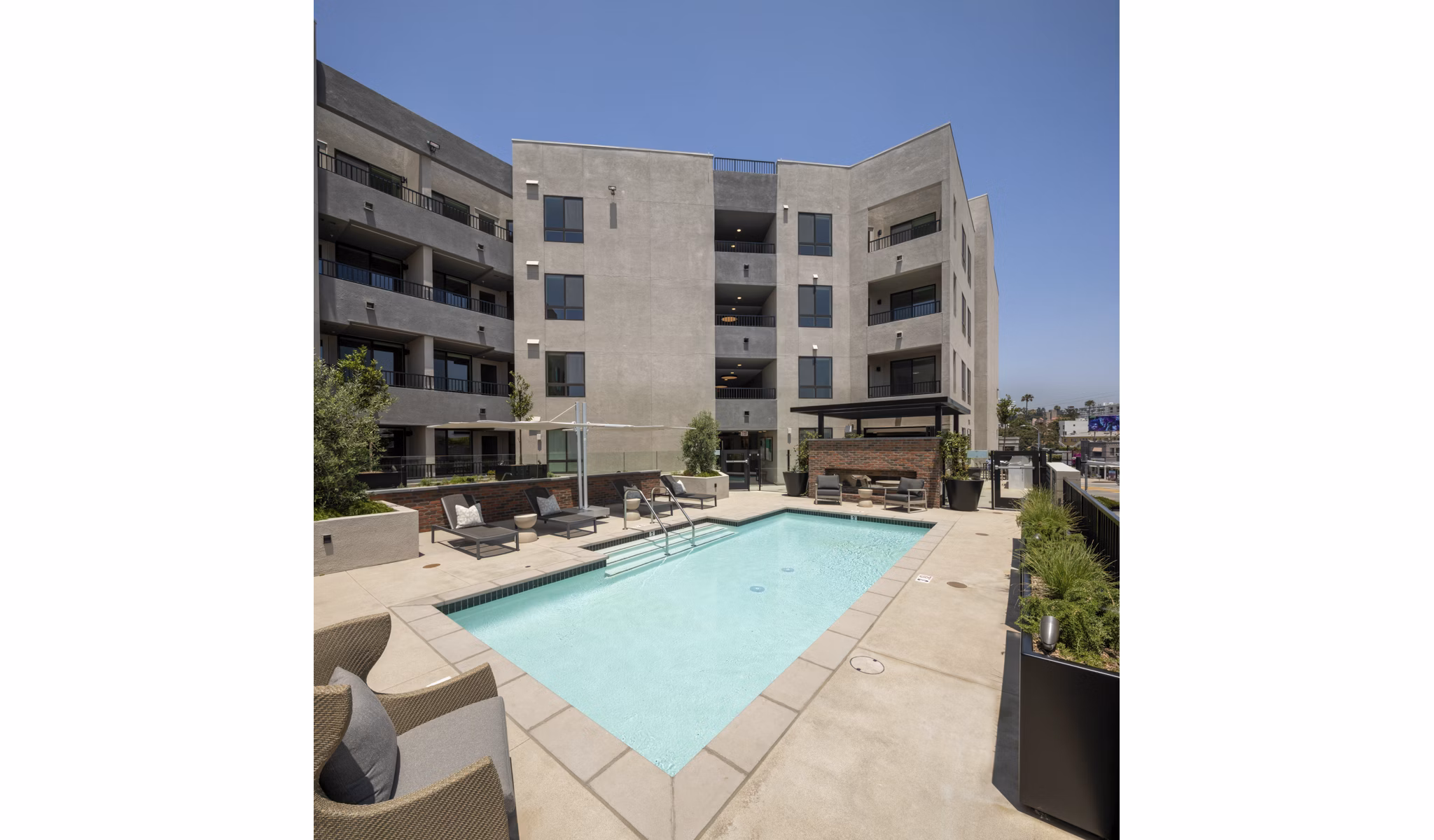 Rae on Sunset: Stylish pool area at luxury apartments in vibrant West Hollywood