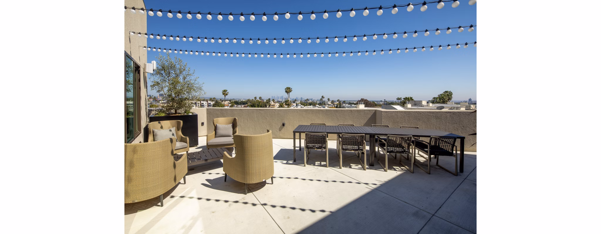 Rooftop deck offering skyline views at Rae on Sunset Apartments