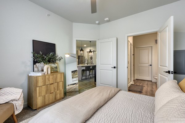 Bedroom featuring modern decor and spacious layout at Tacara Gruene Apartments