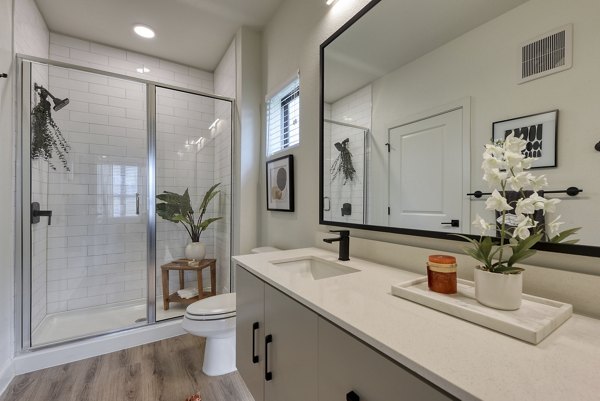 Modern bathroom with elegant fixtures at Tacara Gruene Apartments, offering luxury living experiences