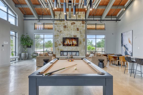 Clubhouse with stylish seating and modern decor at Tacara Gruene Apartments, a luxury property by Greystar in Gruene, Texas