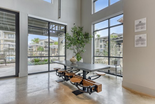 Modern clubhouse with cozy seating and stylish decor at Tacara Gruene Apartments