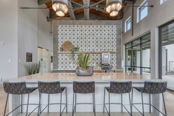 Modern clubhouse with comfortable seating at Tacara Gruene Apartments