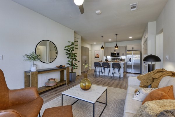 Spacious living room with modern decor in Tacara Gruene Apartments