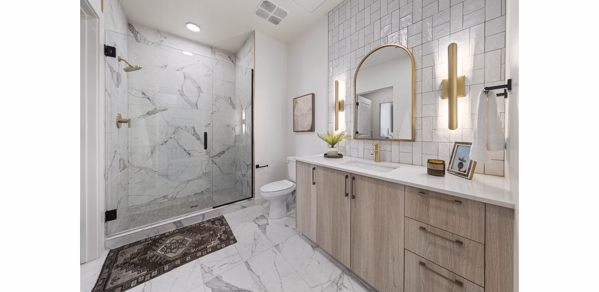 Modern bathroom with sleek fixtures at Moontower PHX Apartments, offering luxury living experience in prime Phoenix location