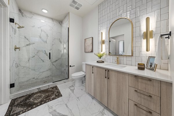 Modern bathroom with sleek fixtures at Moontower PHX Apartments, offering luxury living experience in prime Phoenix location