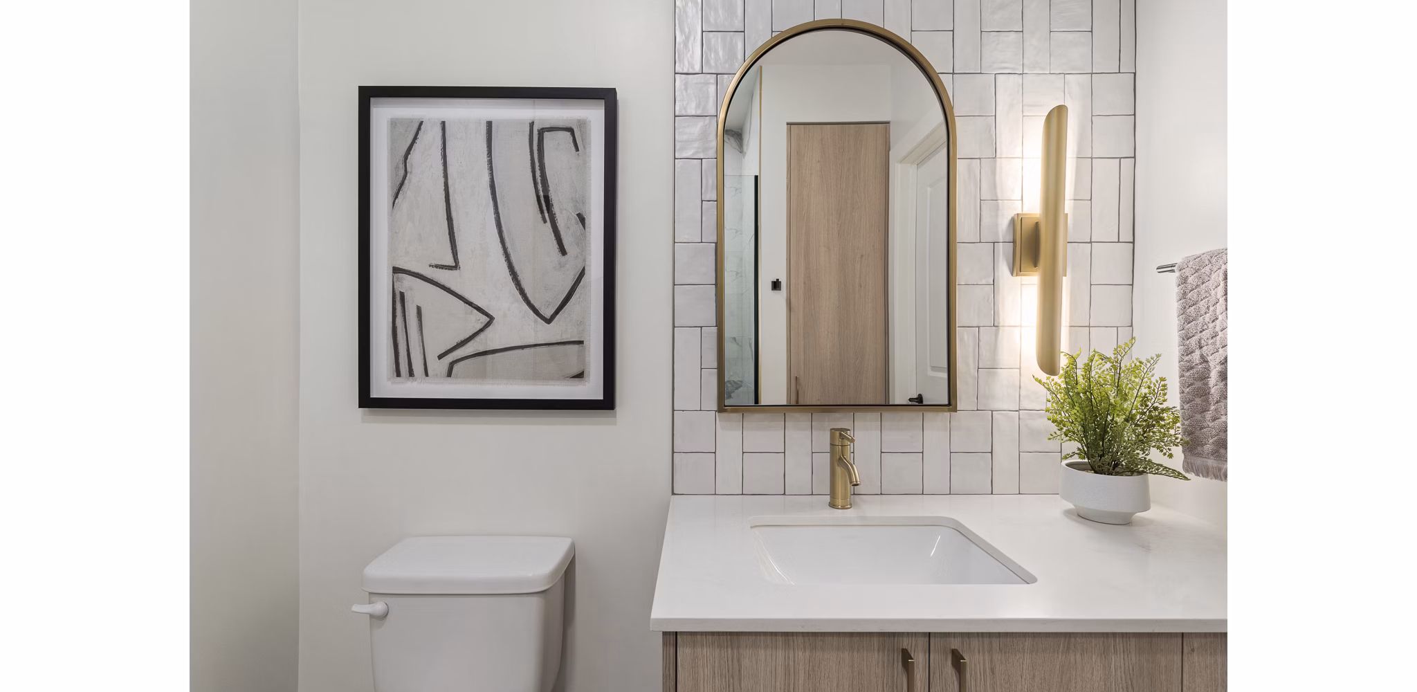 Moontower PHX Apartments: Modern bathroom with sleek finishes and spacious layout