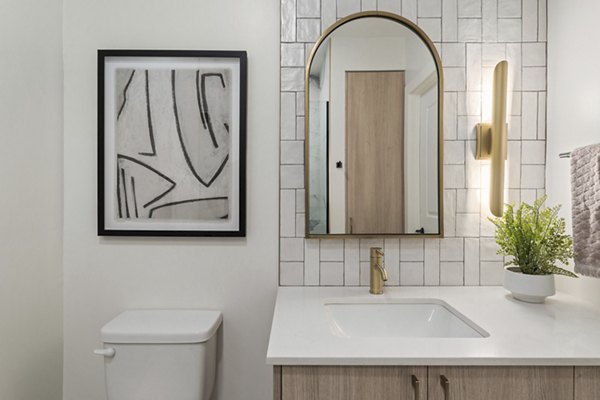 Moontower PHX Apartments: Modern bathroom with sleek finishes and spacious layout